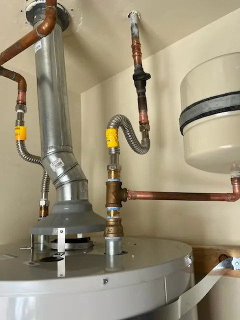 Water heater installation and plumbing repair in The Core
